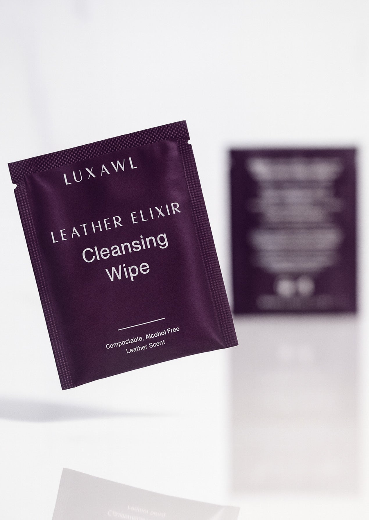 Front and Back image of premium leather cleaning wipe for leather bags and shoes